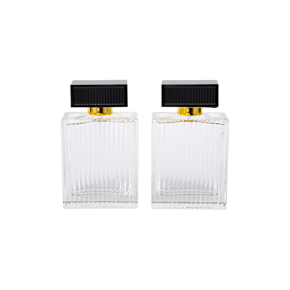 KY1112-WJ2092 100 ml függőleges csíkos üveg parfümös üveg Abs műanyag borító csíkokkal